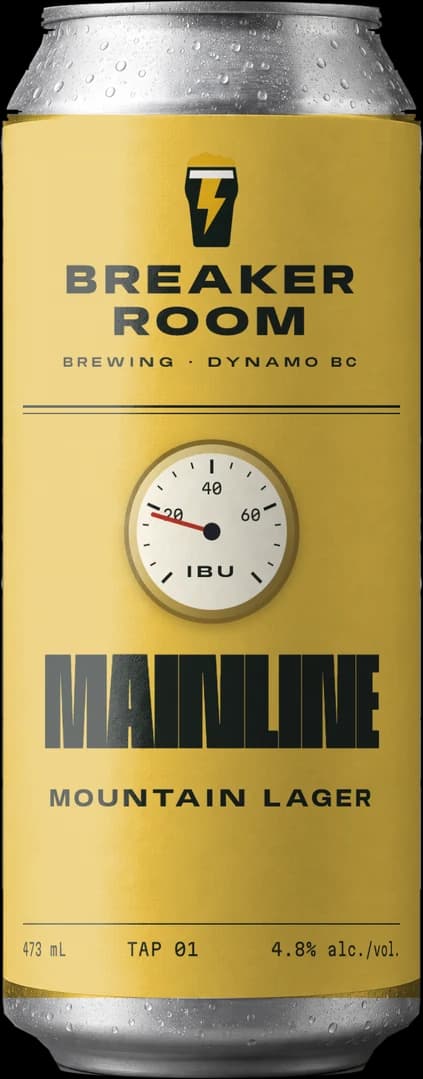A can of Mainline Lager standing beside the pint